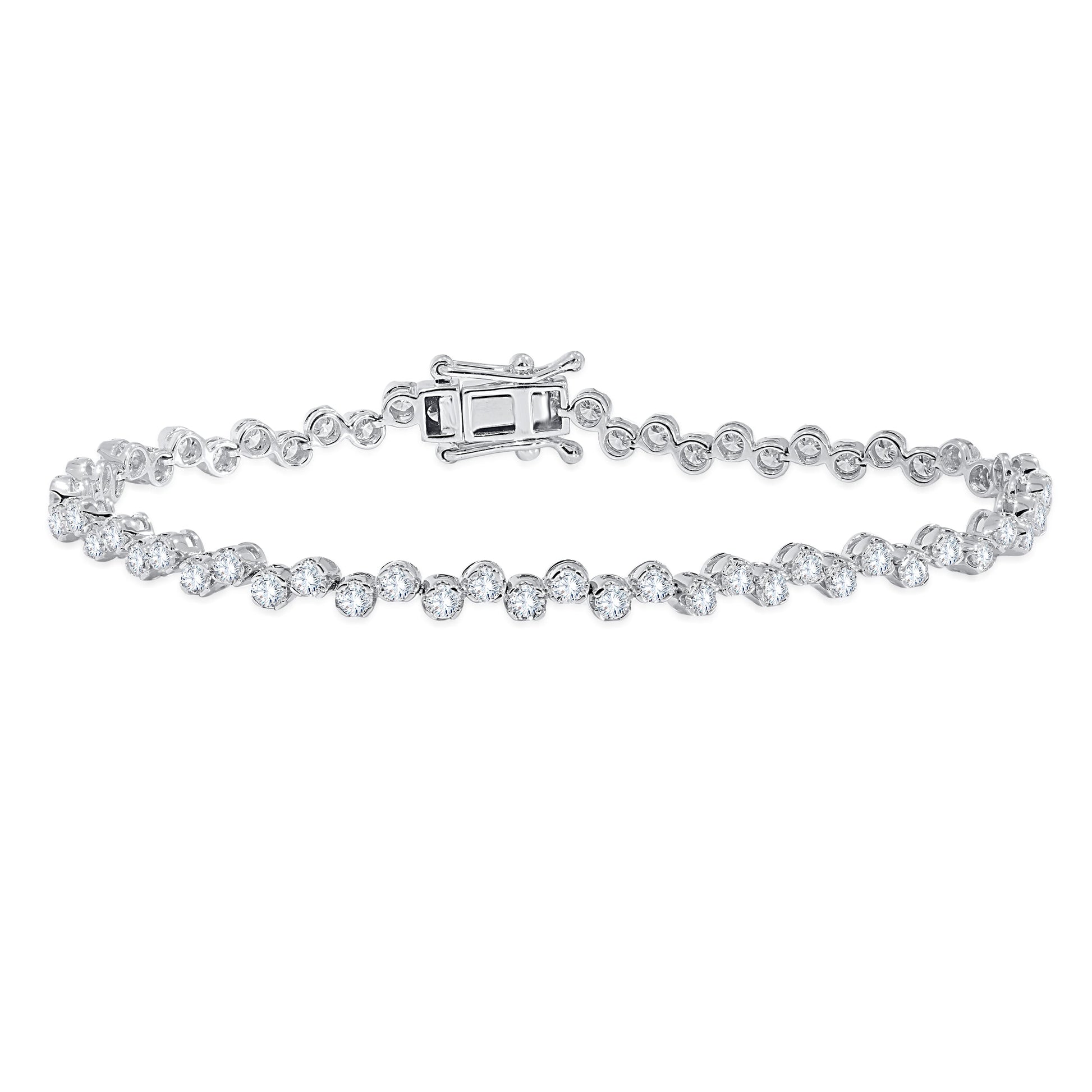 14k white gold wave style bezel set diamond bracelet 3.39 carat